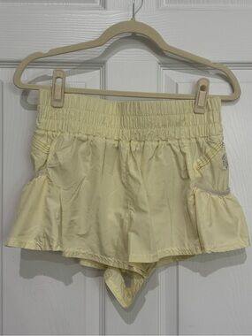 FP Movement by Free People Pale Yellow Athletic Ruffle Hem Shorts